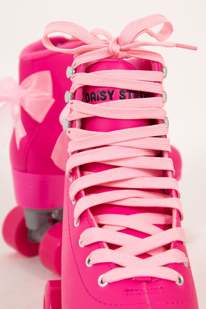 Daisy Street Exclusive Roller Skates in Pink with Bow Details