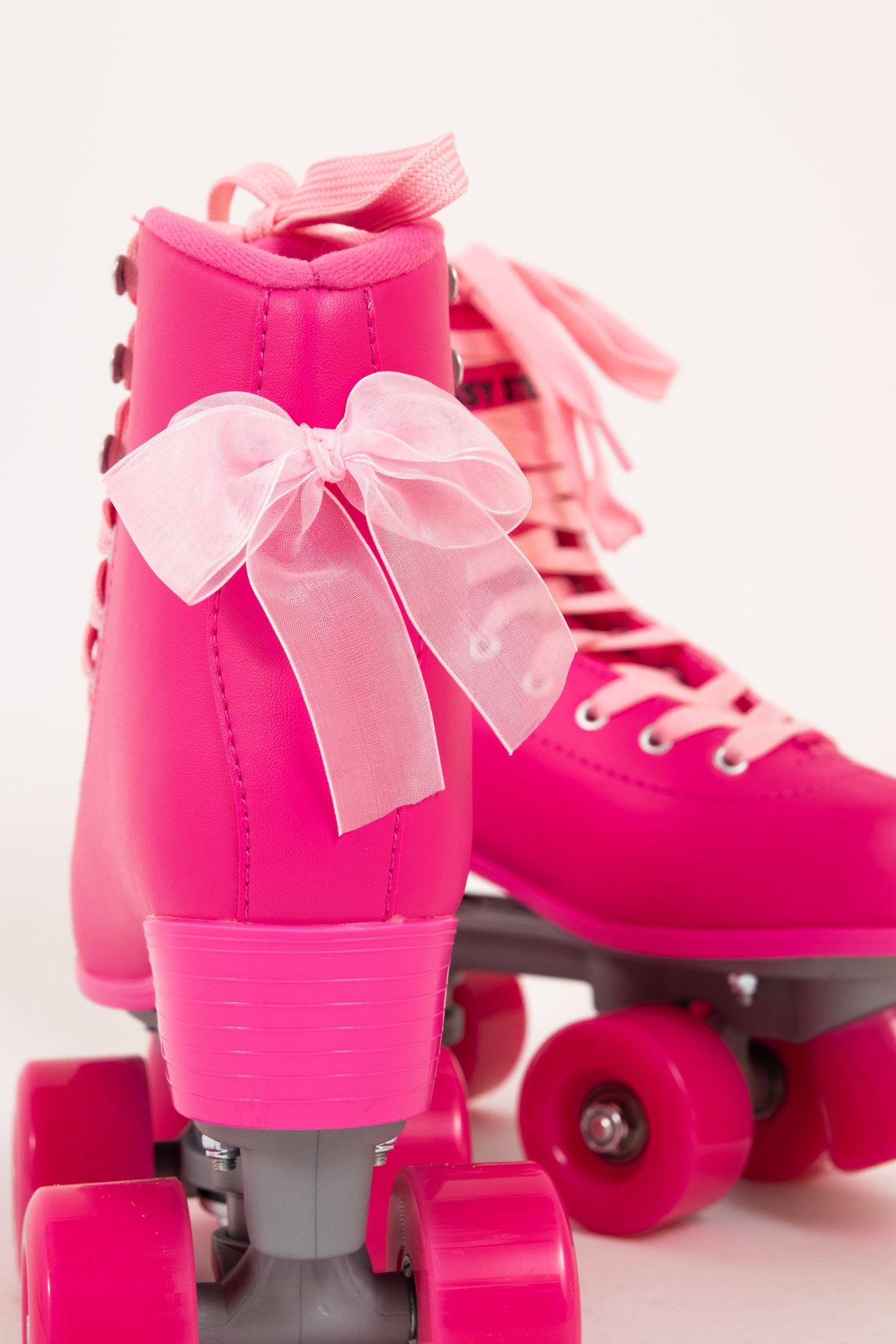 Daisy Street Exclusive Roller Skates in Pink with Bow Details